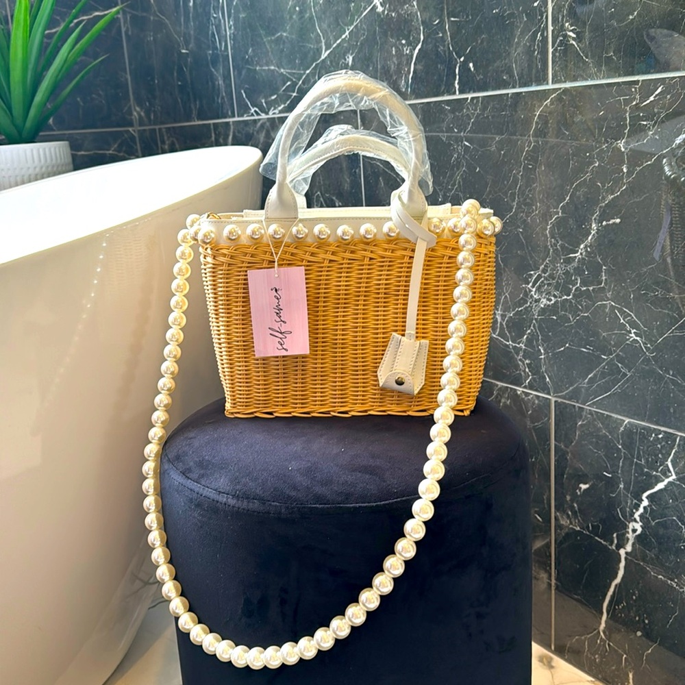 Self-same bag with beautiful pearl..